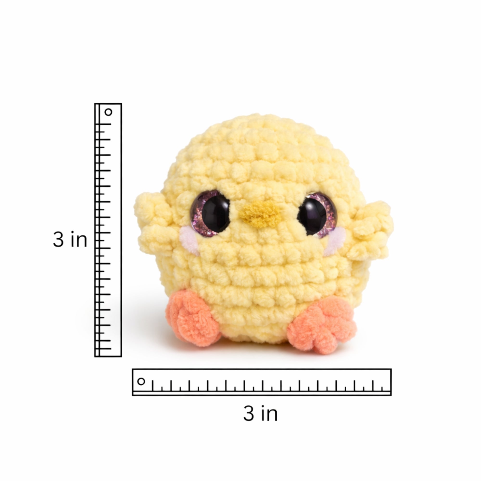 crochet baby chick plush with ruler showing 3 inch size