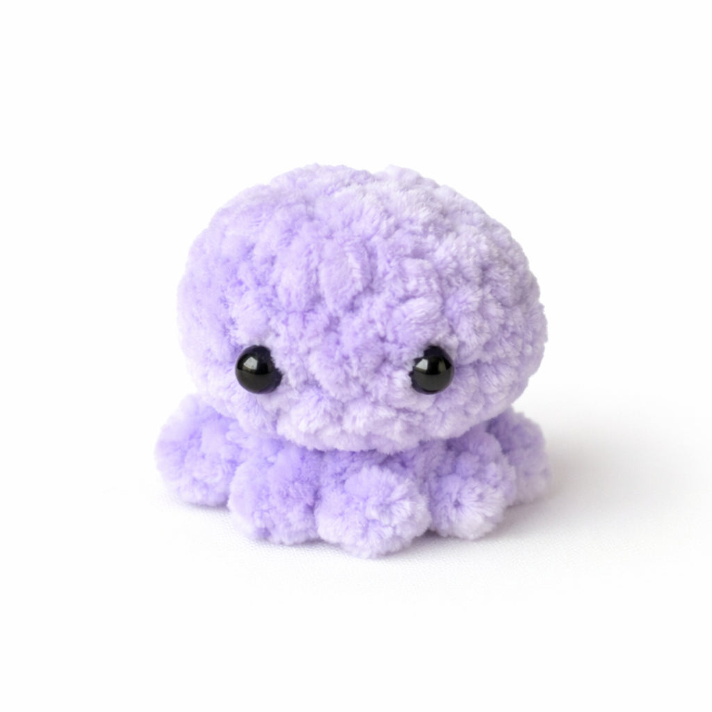 Cute purple crochet baby octopus plush handmade amigurumi toy, soft mini octopus perfect for gifts and decor