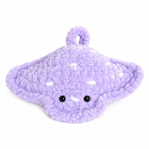 Handmade crochet baby stingray plush in purple color, soft amigurumi ocean toy with cute face