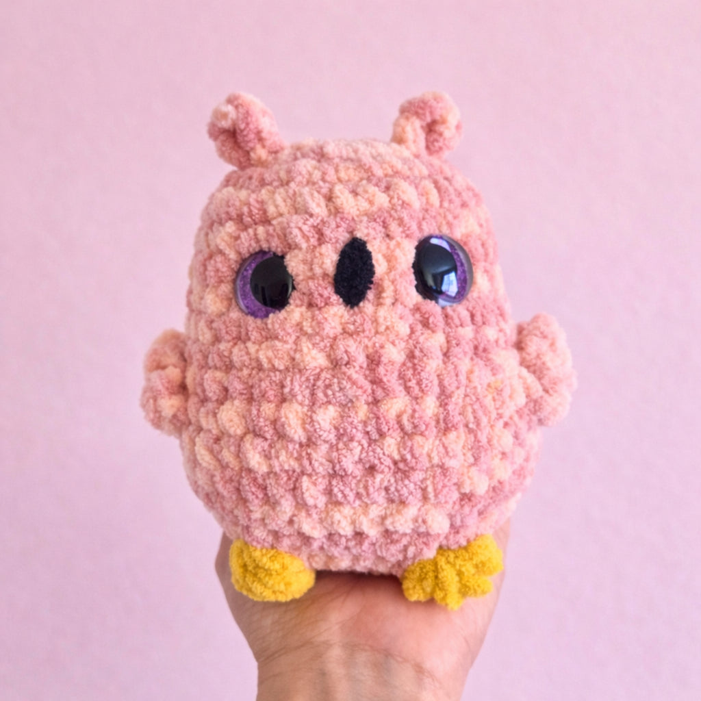 small crochet owl plush in hand