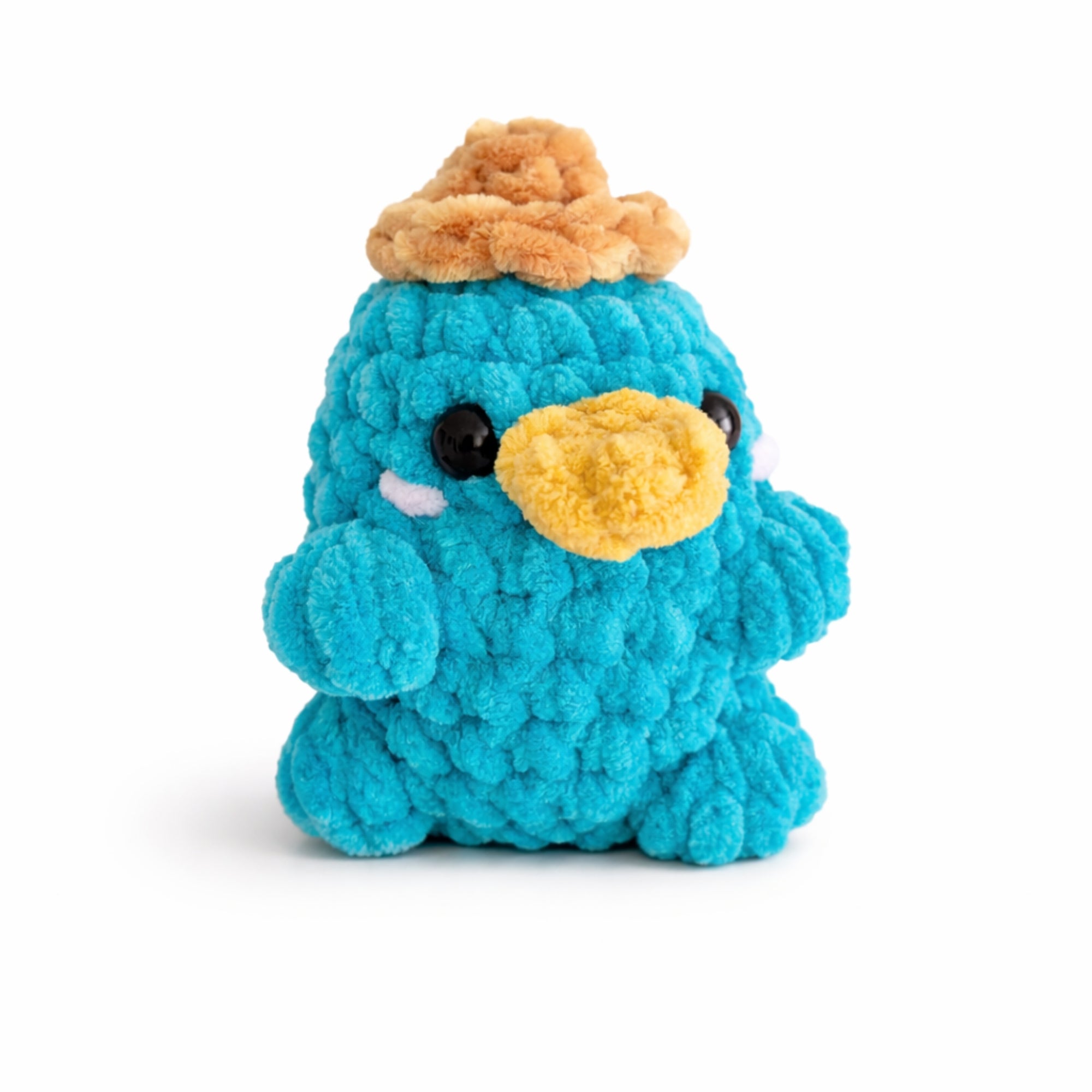 Handmade crochet platypus plush amigurumi toy with soft chenille yarn.