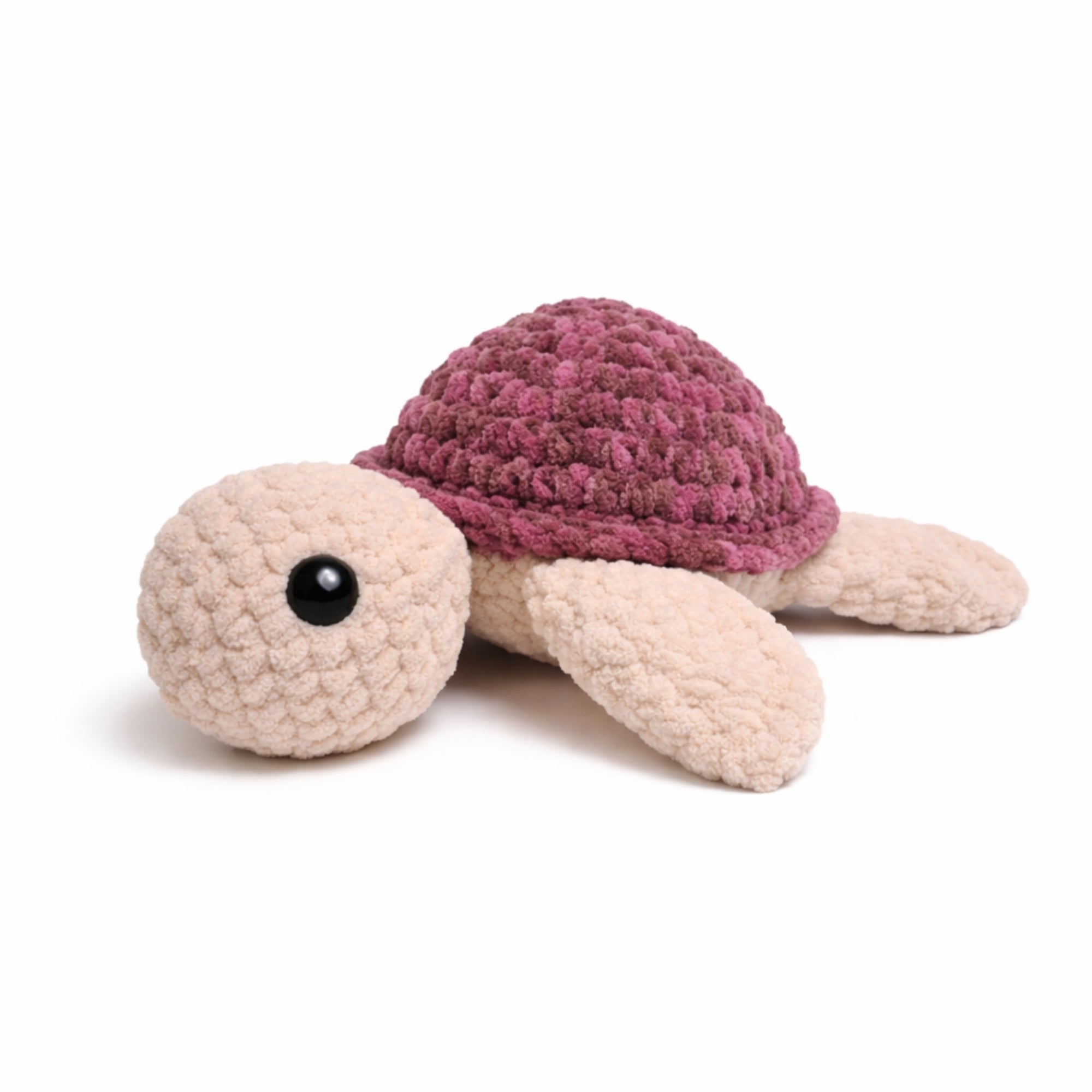 Handmade crochet turtle plush with dusty rose shell and beige body, soft amigurumi stuffed animal.