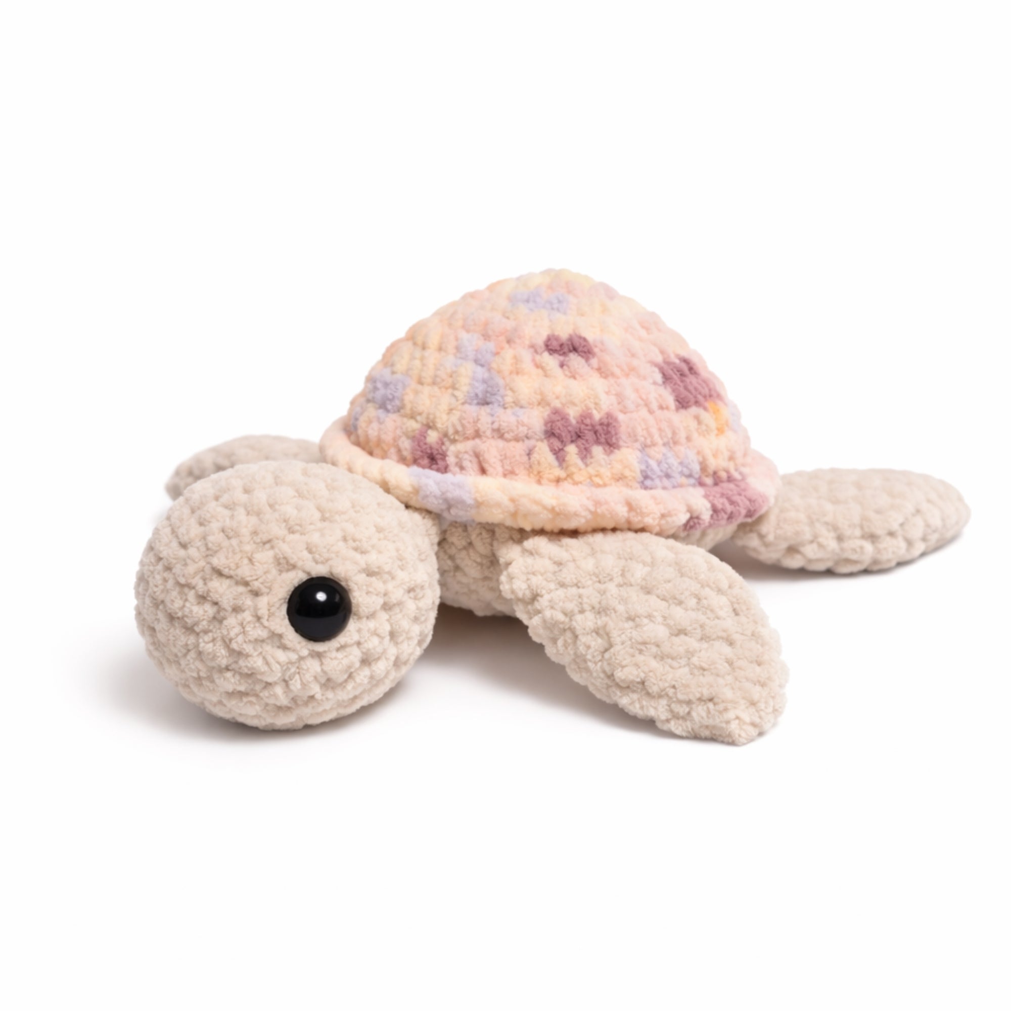 Handmade crochet turtle plush with pastel multicolor shell and beige body, soft amigurumi stuffed toy