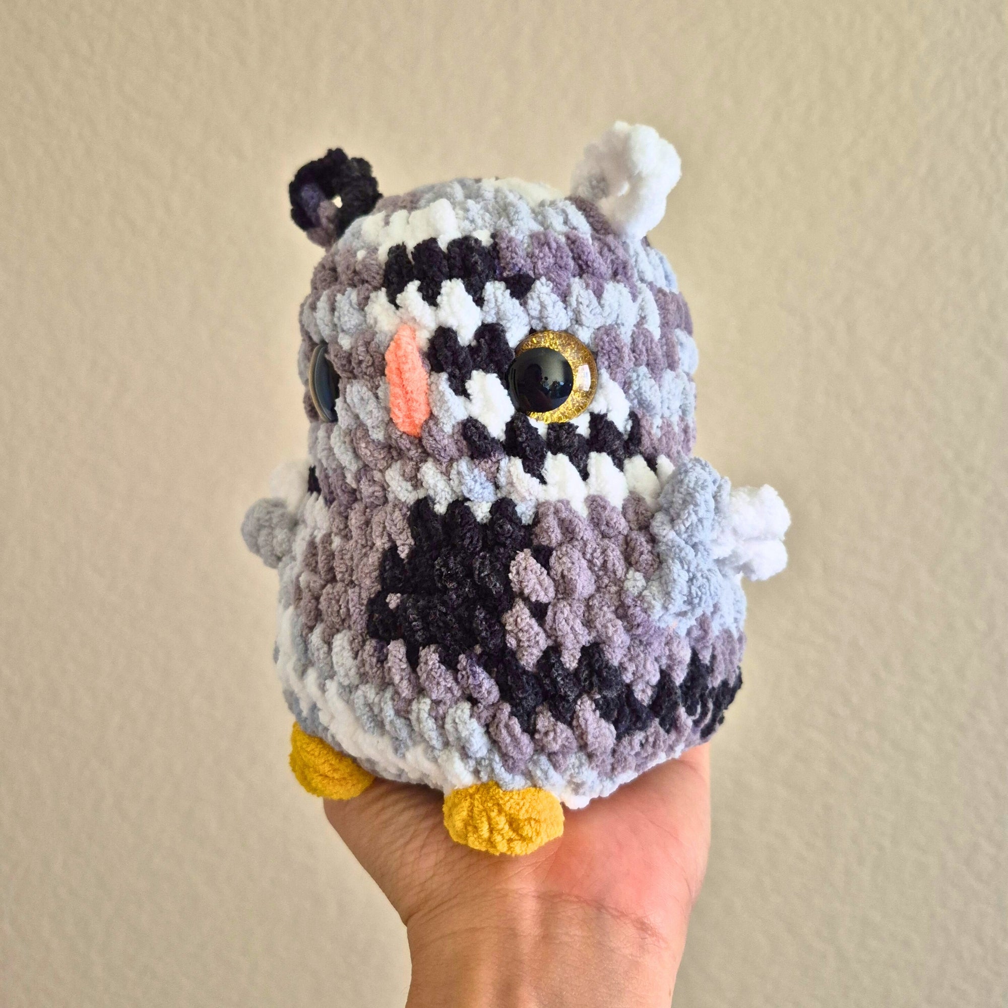 small crochet owl amigurumi plush in hand
