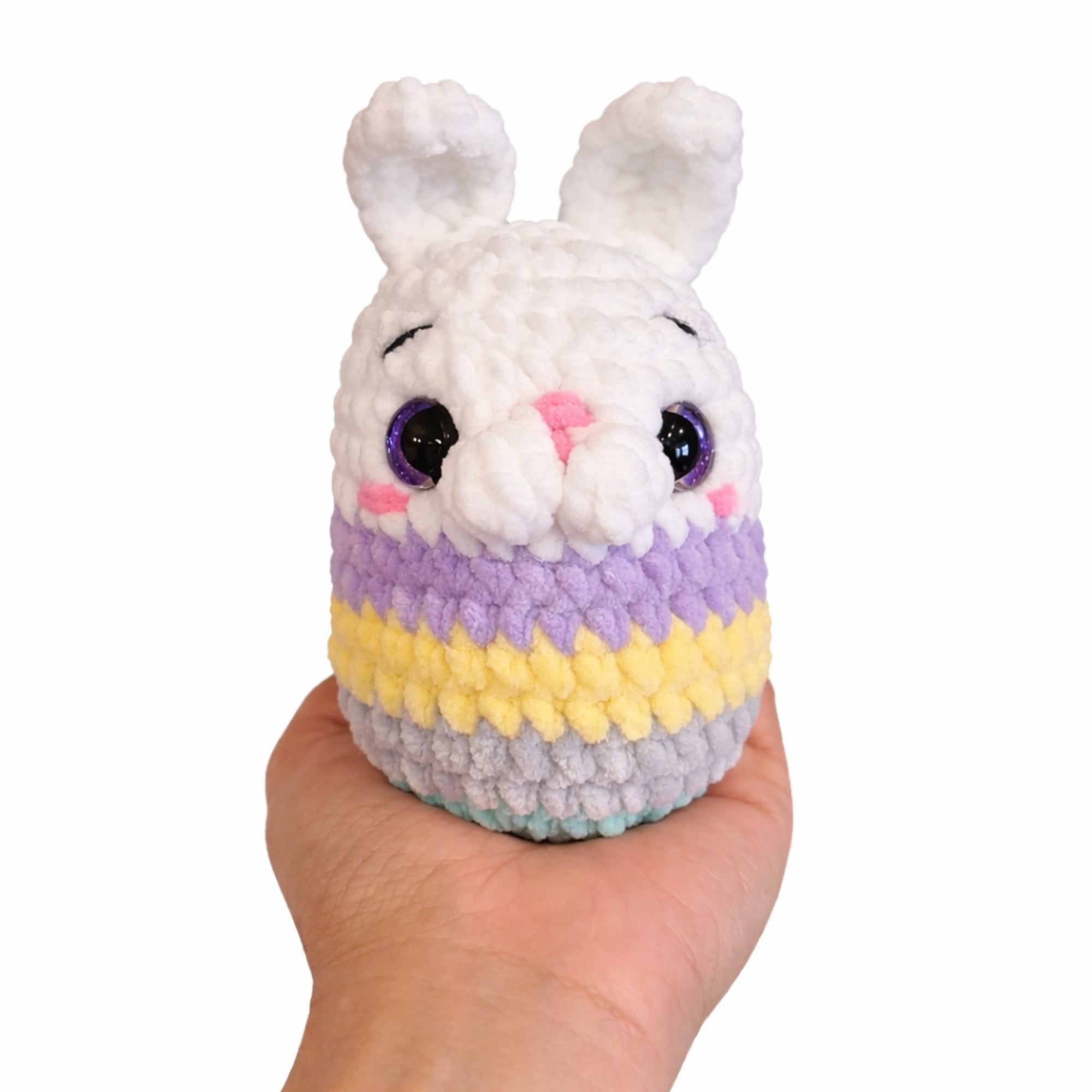 small bunny egg crochet plush in hand