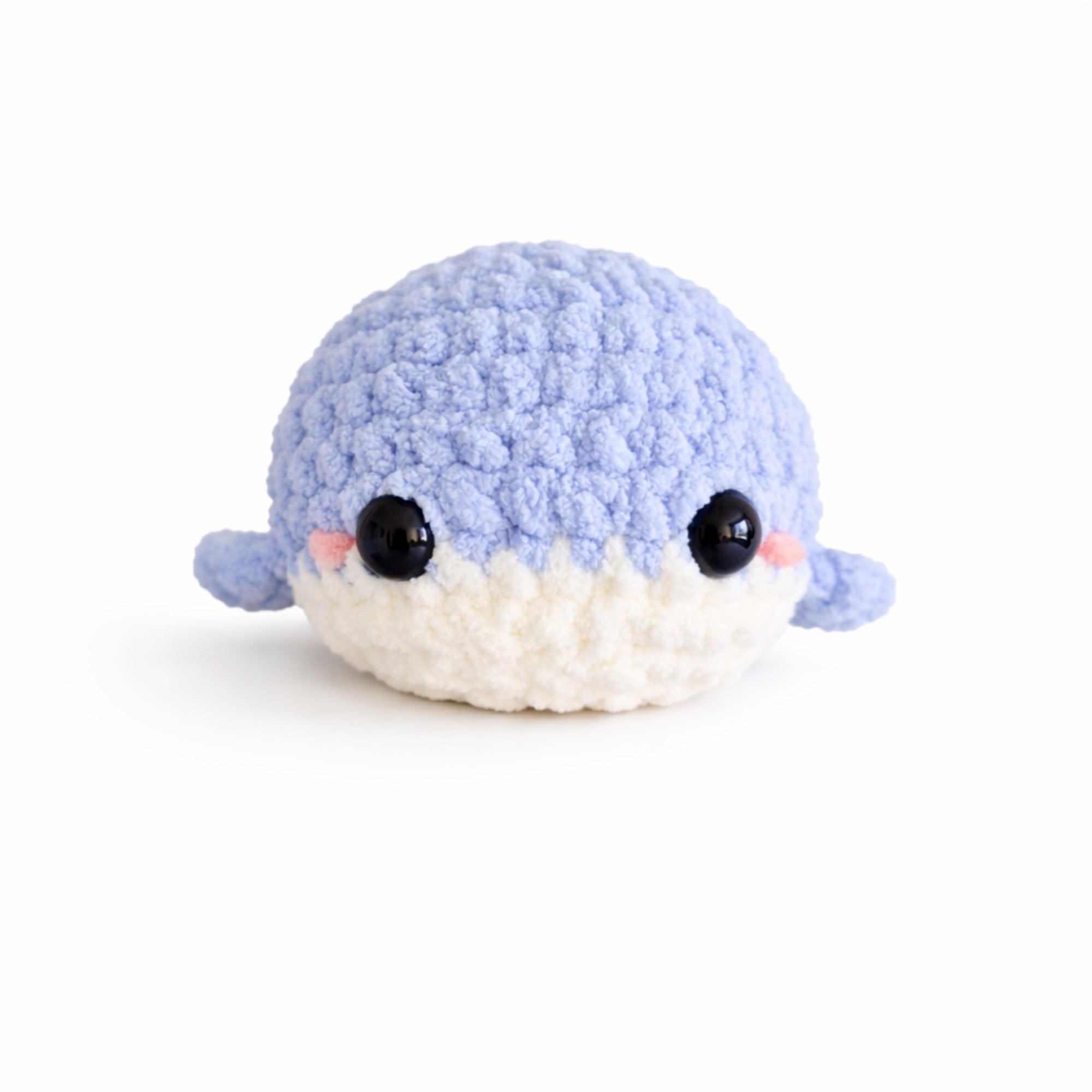 Handmade crochet baby whale amigurumi plush in soft blue chenille yarn with kawaii face