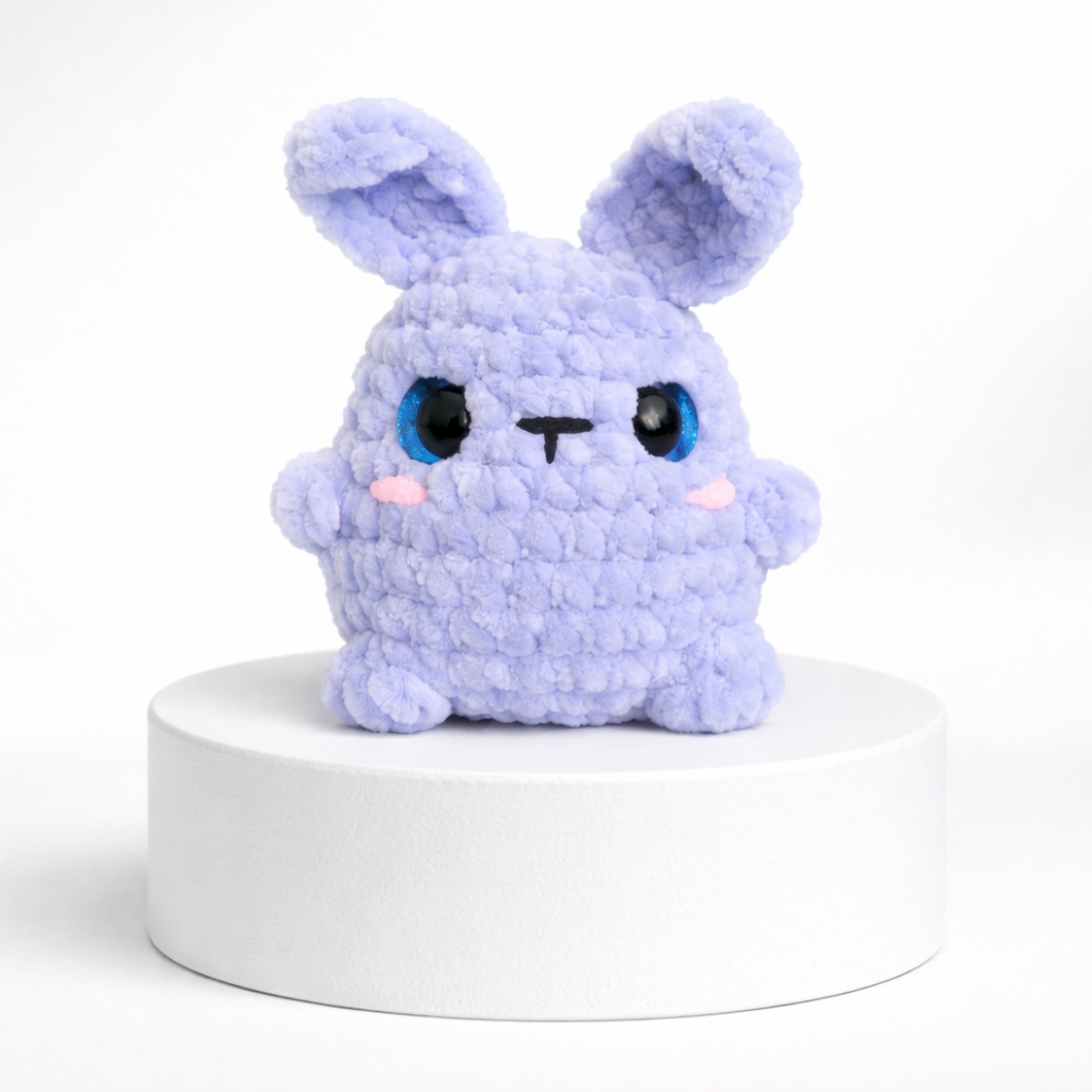 Handmade crochet bunny amigurumi plush toy in blue