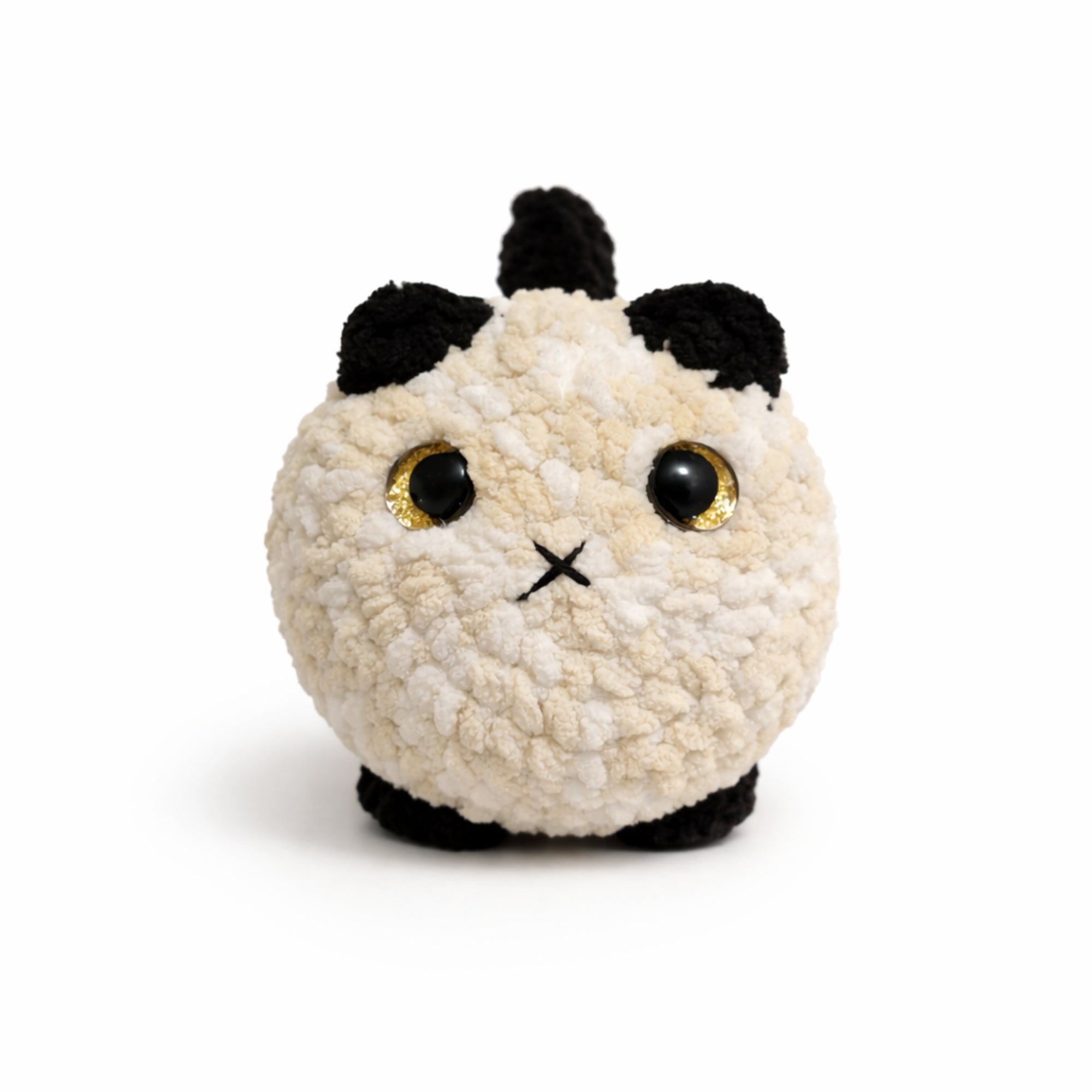handmade crochet cat amigurumi plush toy on white background