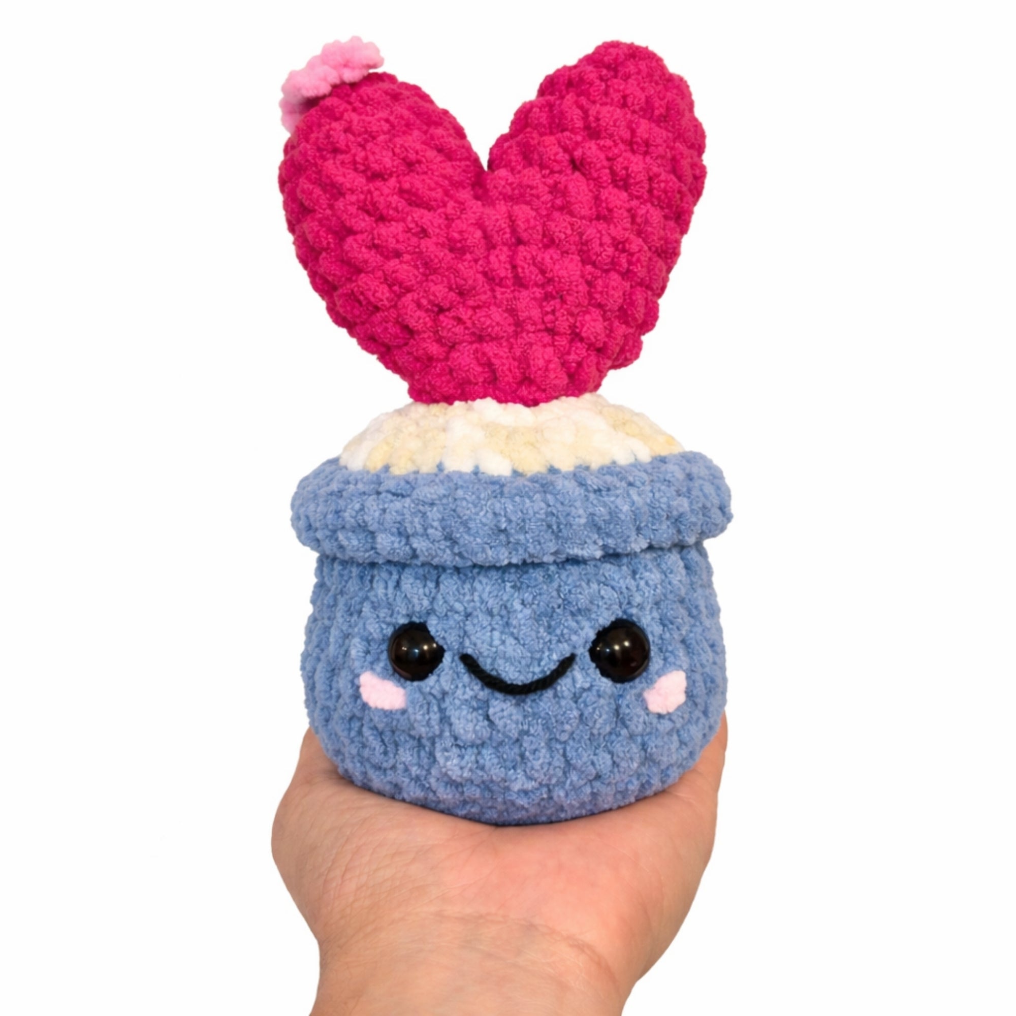 Handmade crochet heart cactus plush size comparison shown in hand