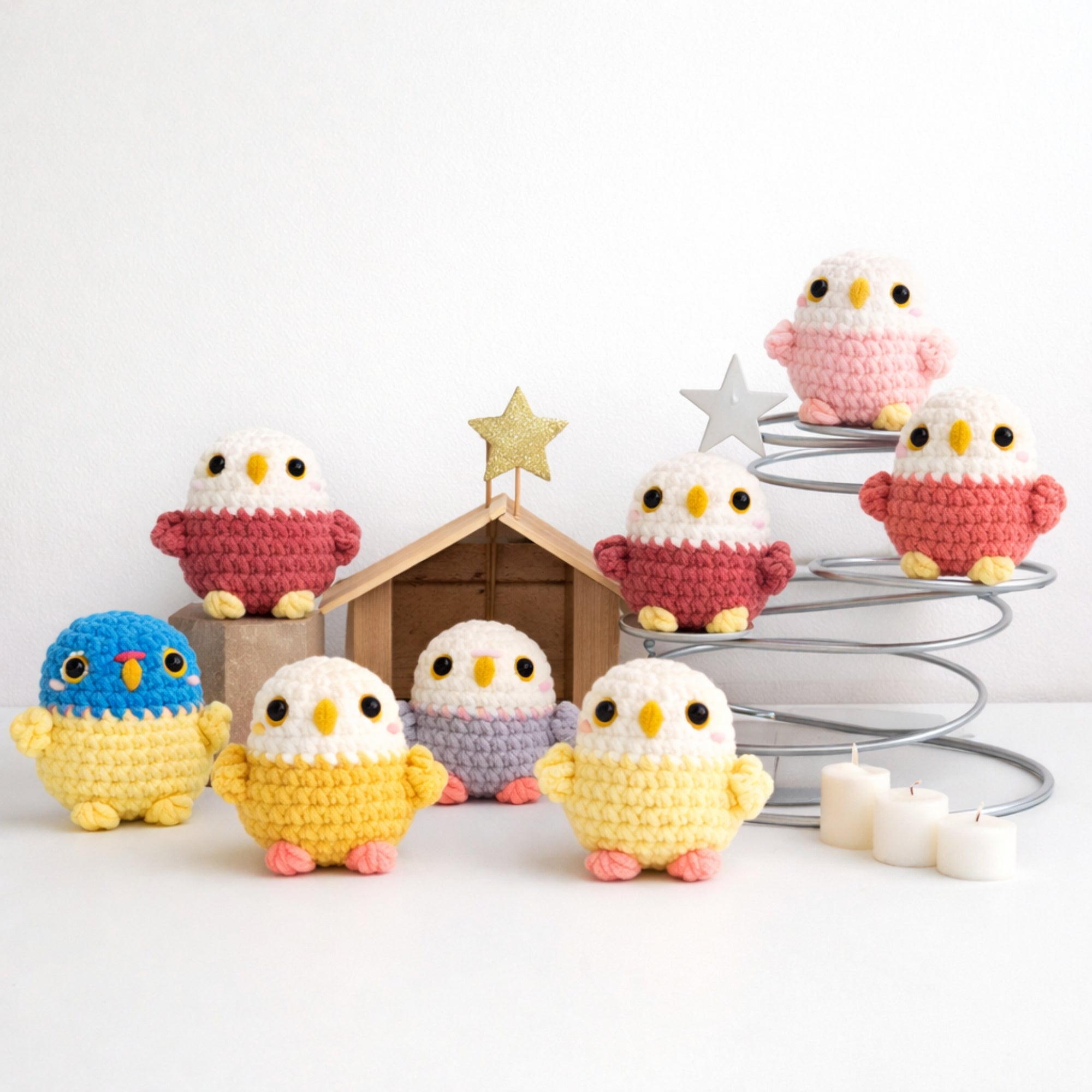 Colorful handmade crochet owl amigurumi collection displayed together