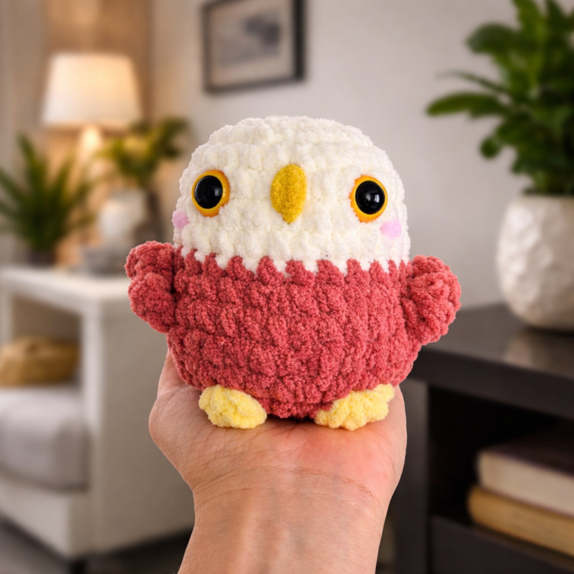Handmade crochet owl plush amigurumi shown in hand for size reference