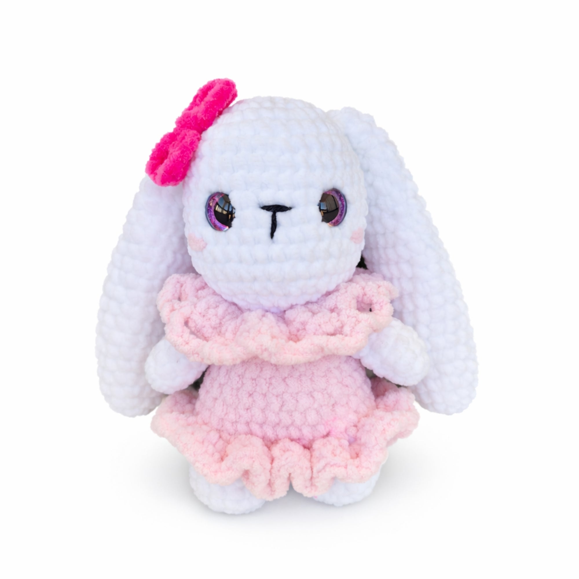 Handmade kawaii crochet bunny plush wearing pink dress o