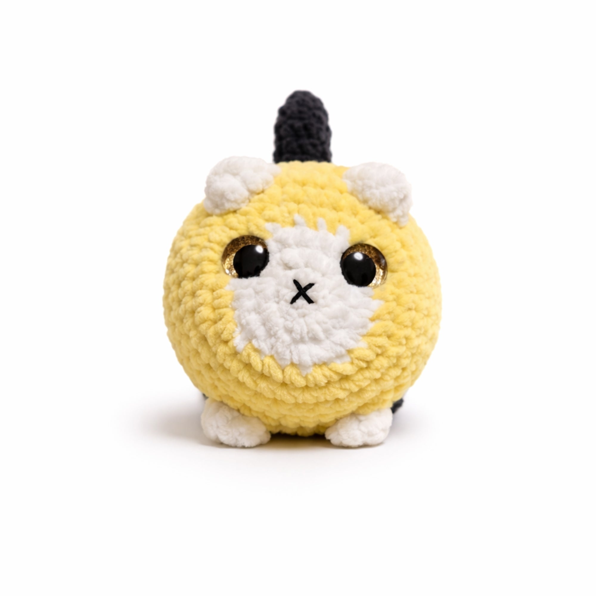 yellow handmade crochet cat amigurumi plush toy with white face
